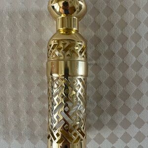 Vintage Shalimar gold woven canister.